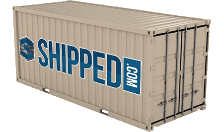 A new shipping container in beige with a large painted blue Shipped.com logo on the side