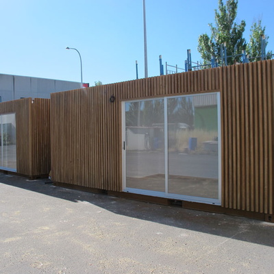 Shipping container homes with svelte organic wood laminate