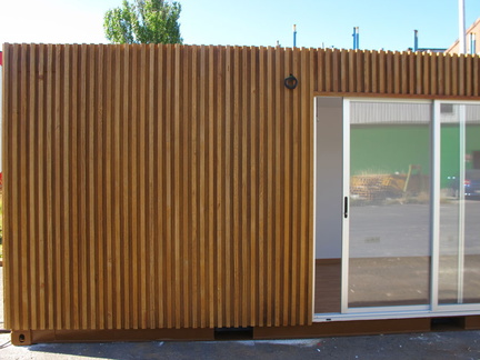 shipping-container-home-with-svelte-organic-wood-laminate-3